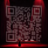 QR Code Expert beautiful example: Empty theater stage.